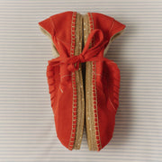 Women's Avenue Espadrille in Strawberry nylon and suede, single shoe with the laces tied in a bow on a striped surface