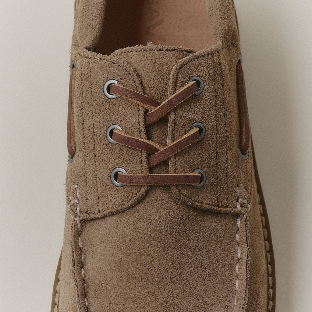 Men's Larkspur Lug Boat Shoe in Cement suede, close up of the laces and eyelets