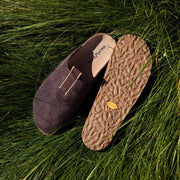 Men's Tiburon Trekker sandal in Espresso suede, pair in grass, one showing the Vibram outsole