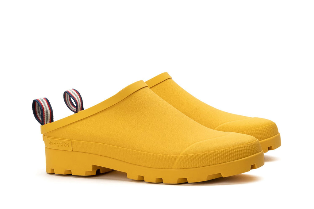 Men's Bodega Clog in Calendula rubber, three-quarter view