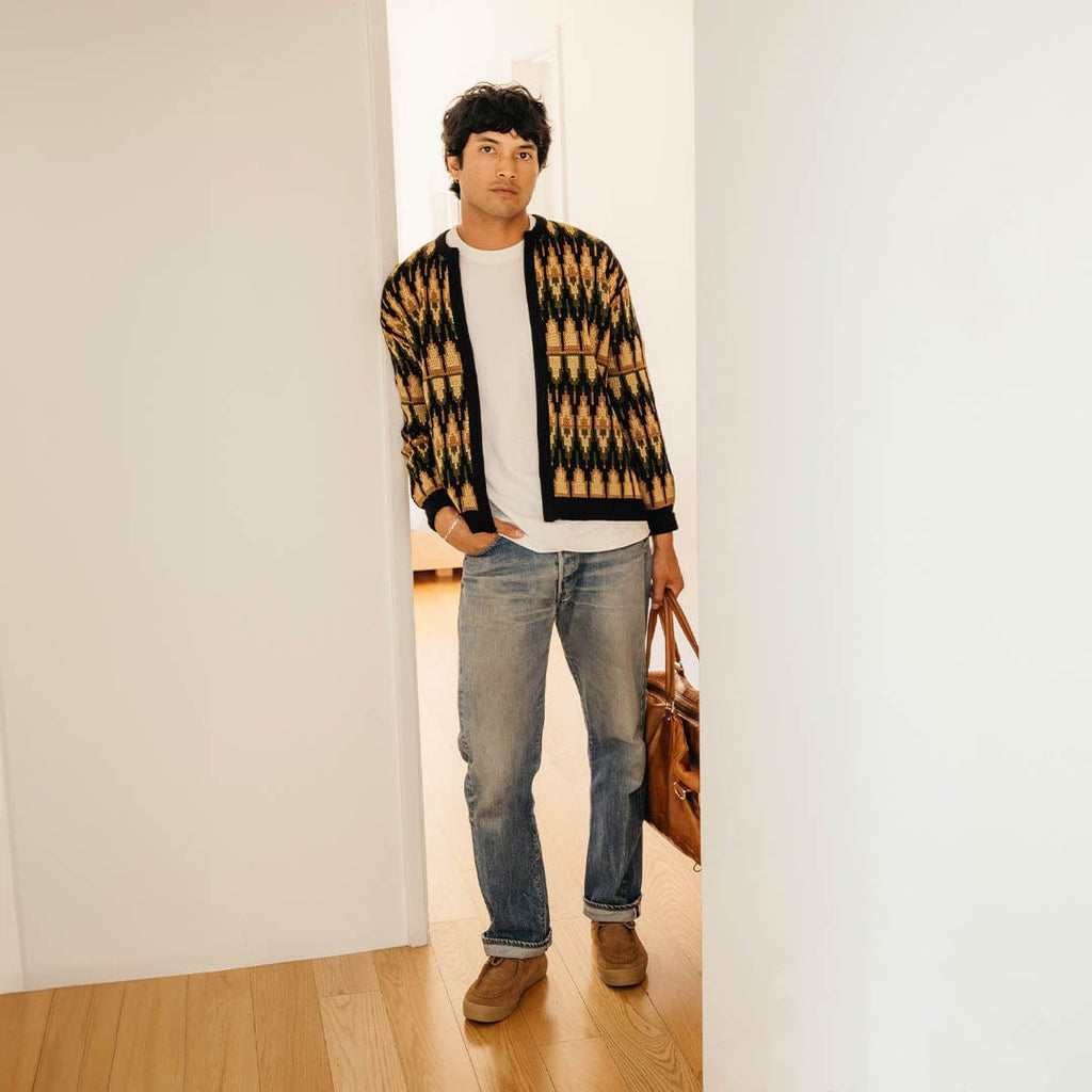 Men's Hayward Loafer in Tobacco suede, worn by a person in a patterned cardigan standing in a doorway