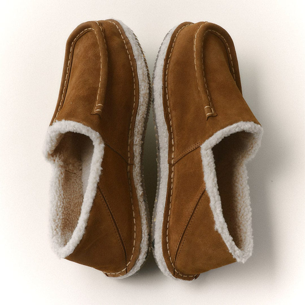 Men's Lodge Slipper in Nutmeg suede, pair viewed from above showing the shearling lining