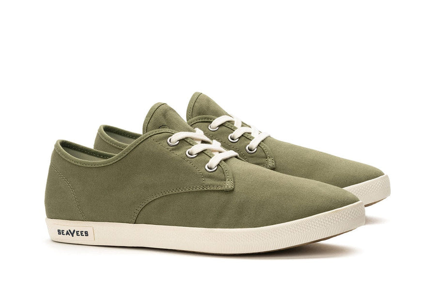 Men's Sixty Six Sneaker in Surplus Green canvas, three-quarter view