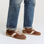 Men's Wilcox Low Profile Trainer sneaker in Cinnamon nylon and suede, worn with cuffed jeans, close up