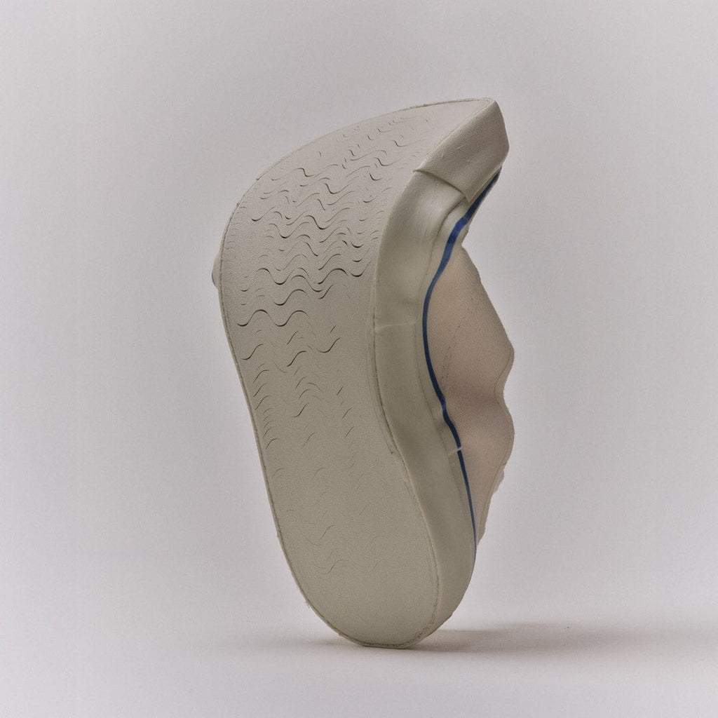 Men's Founders Edition Yacht Shoe in White canvas, outsole view, tilted on a light background