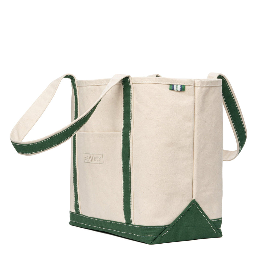 SeaVees natural canvas boat tote bag with hunter green handles, angled view