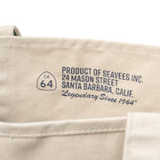 Close up of the printed SeaVees label inside a natural canvas tote bag