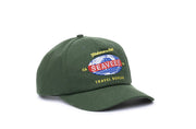 SeaVees Travel Bureau green dad hat with globe patch, front view