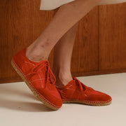 Women's Avenue Espadrille in Strawberry nylon and suede, worn with a cream skirt, close up