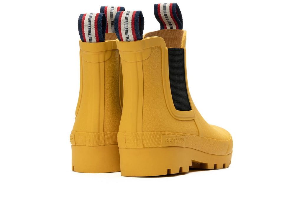 Women's Bolinas Off Shore Boot in Calendula rubber, heel view