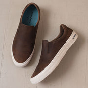 Men's Hawthorne Slip On in Elmwood leather, pair shown top-down on a light surface