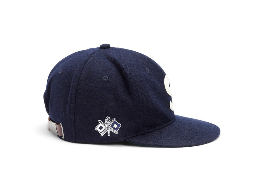 SeaVees x Ebbets Field navy wool ballcap, side view with small flag logo
