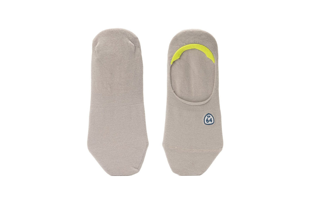 Women's Hideaways no-show socks in gray with yellow heel trim, top view