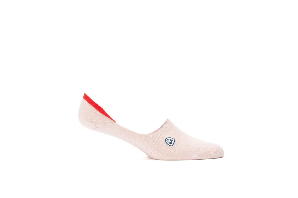Women's Hideaways no-show sock in pink with red heel trim, side view